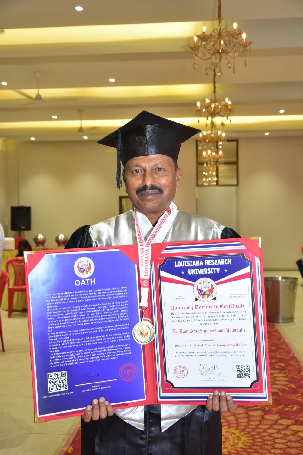 Dr. Ravindra Appa Jnyaneshwar Yelwande receiving Asia Book of Records Grand Master honor for philanthropy