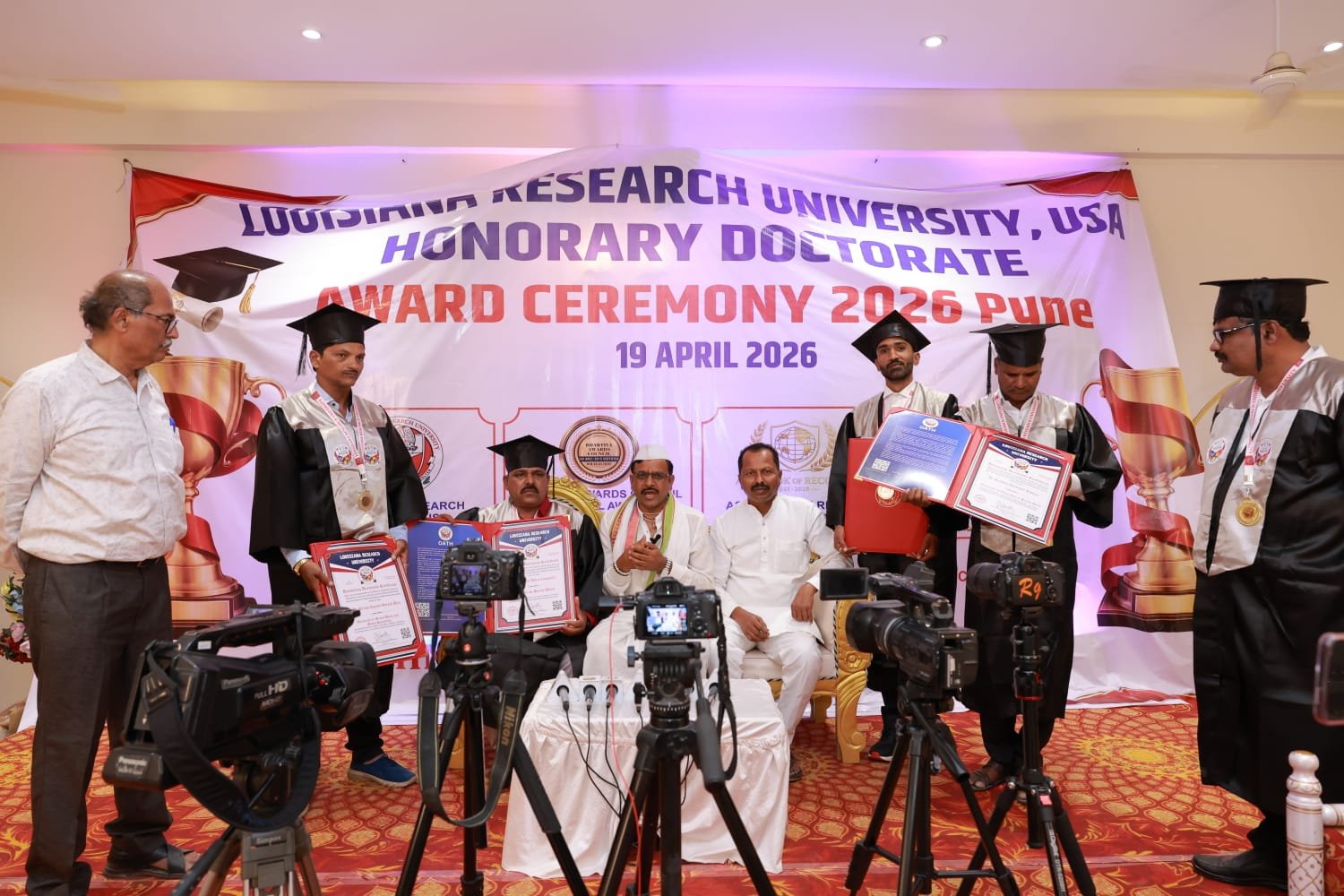 Dr. Ravindra Appa Jnyaneshwar Yelwande receiving Asia Book of Records Grand Master honor for philanthropy