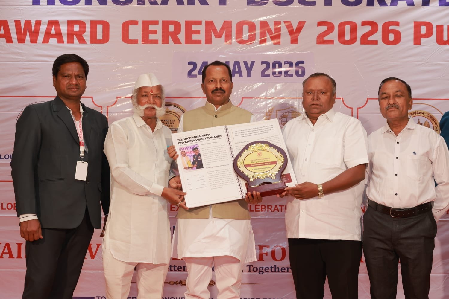 Dr. Ravindra Appa Jnyaneshwar Yelwande receiving Asia Book of Records Grand Master honor for philanthropy